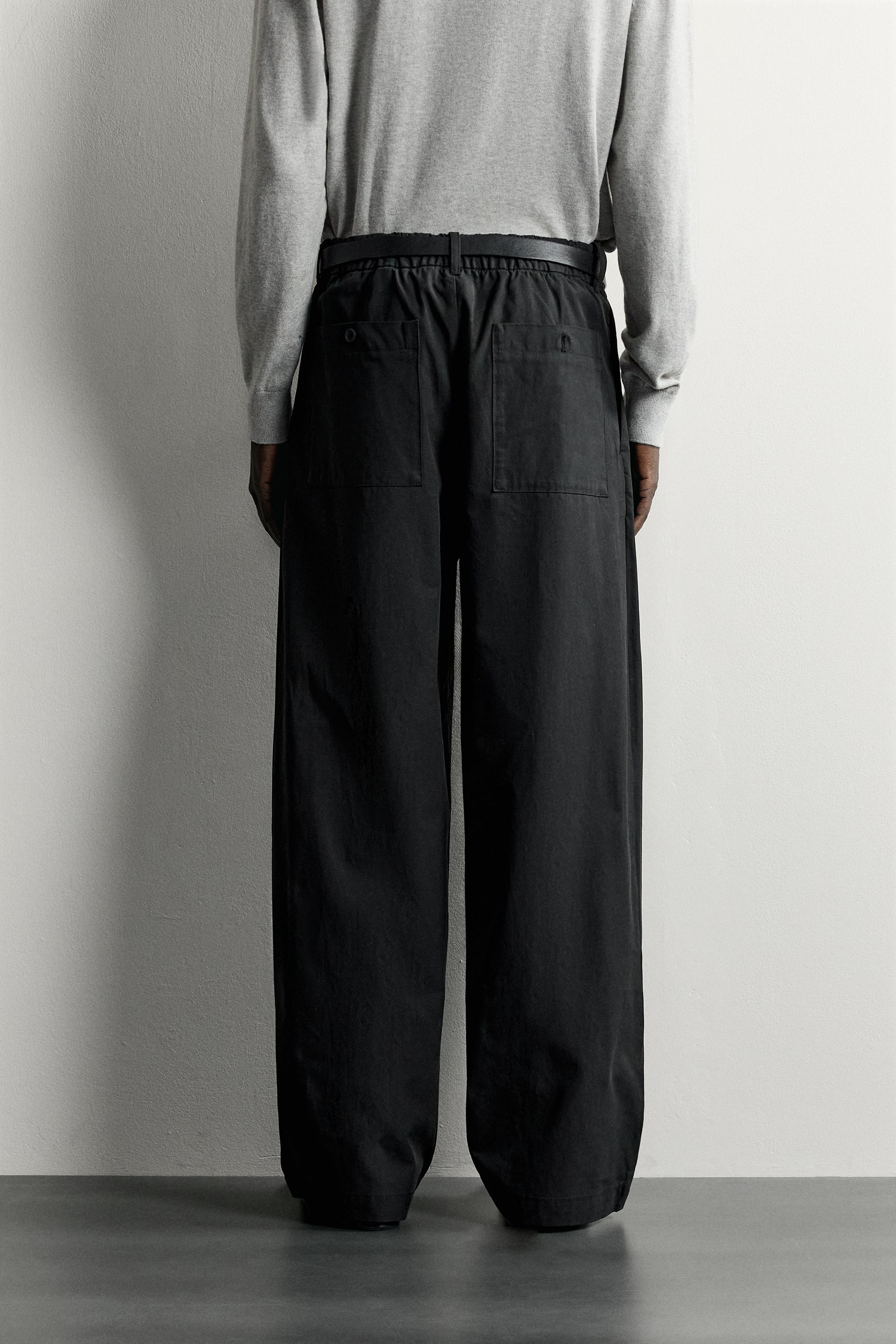 STRAIGHT-FIT PANTS WITH SIDE PLEATS